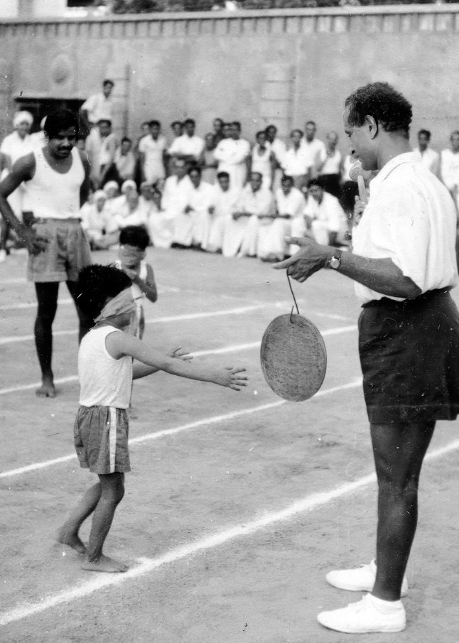 Promesse with Udar-da in Blind Man's Buff Game — Behind is Narendra