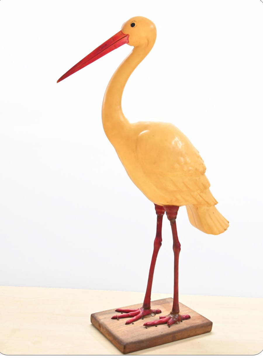 This crane (batak), decorated with balloons, was given to Promesse on one of his birthdays