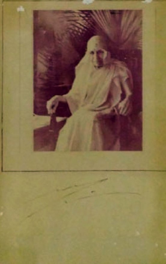 The Mother's photograph, with the Mother's signature