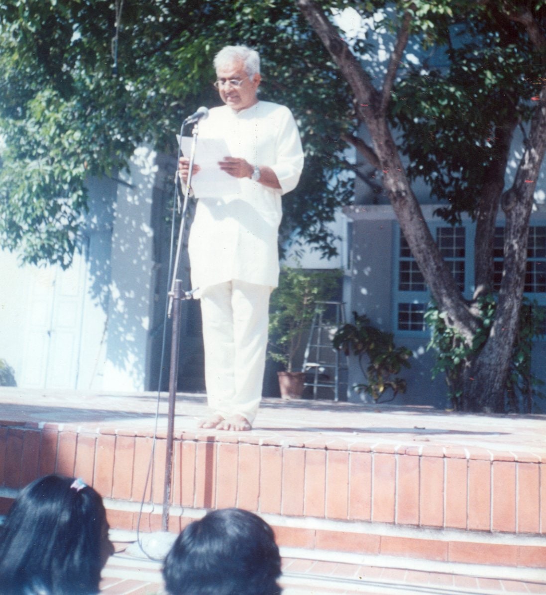 Standing tall — Promesse addressing the school gathering during the Birthday celebration of Dortoir