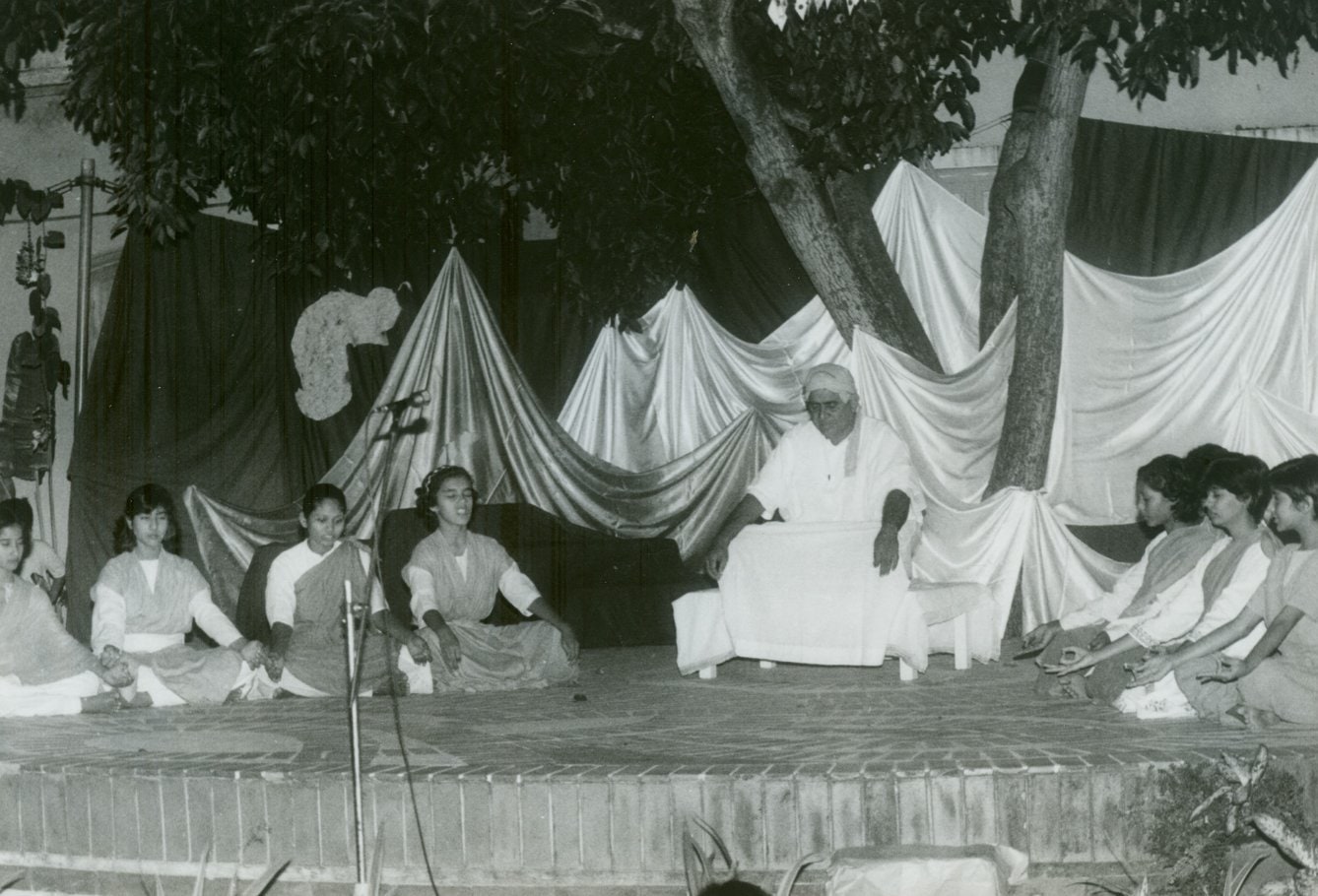 Promesse, the teacher, one with his students during the Dortoir birthday celebrations