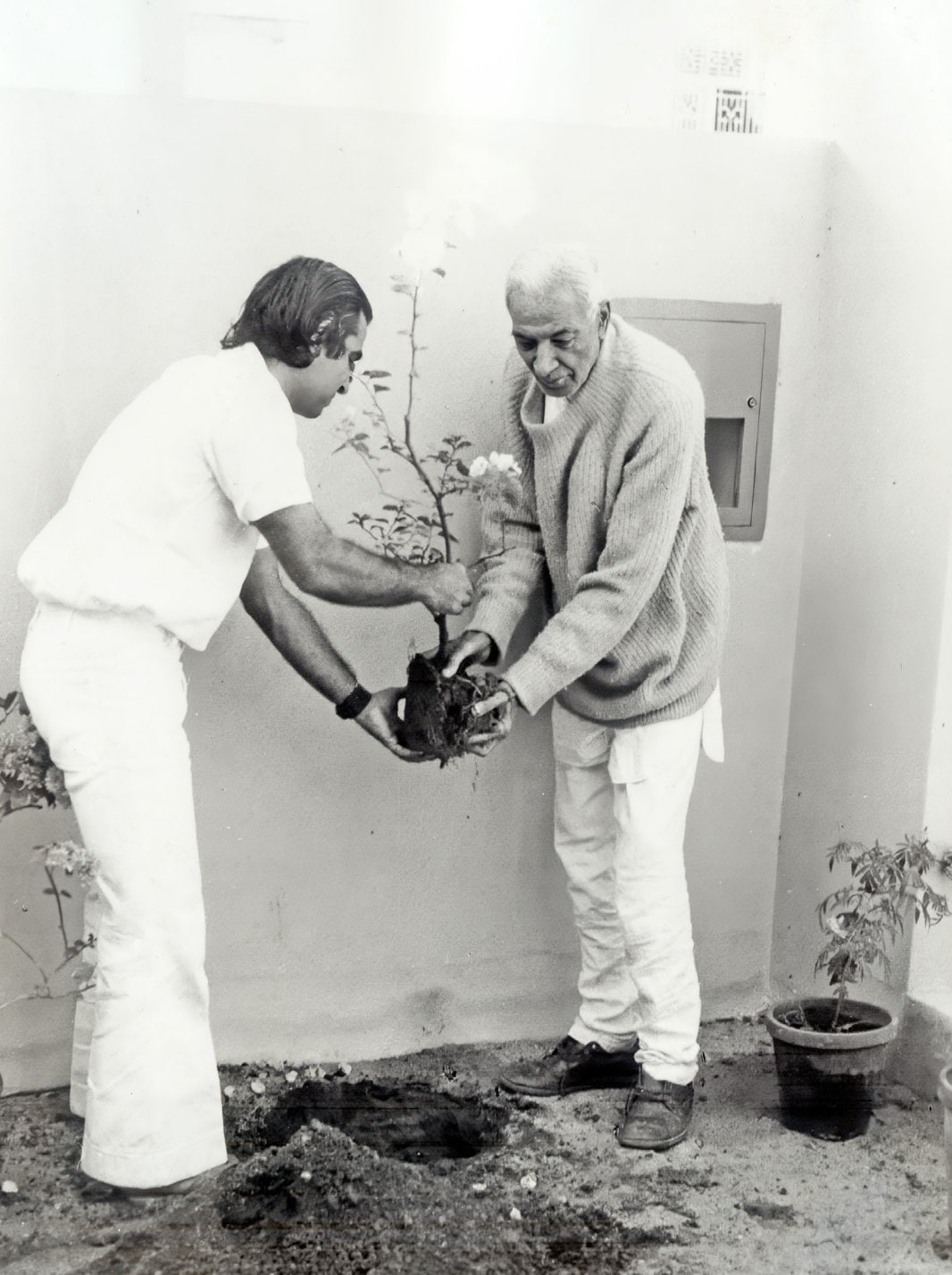 Photograph of Promesse with his father
