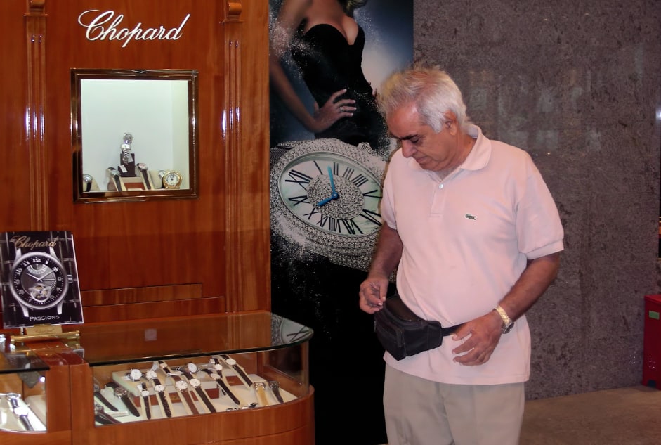 Admiring a collection of watches