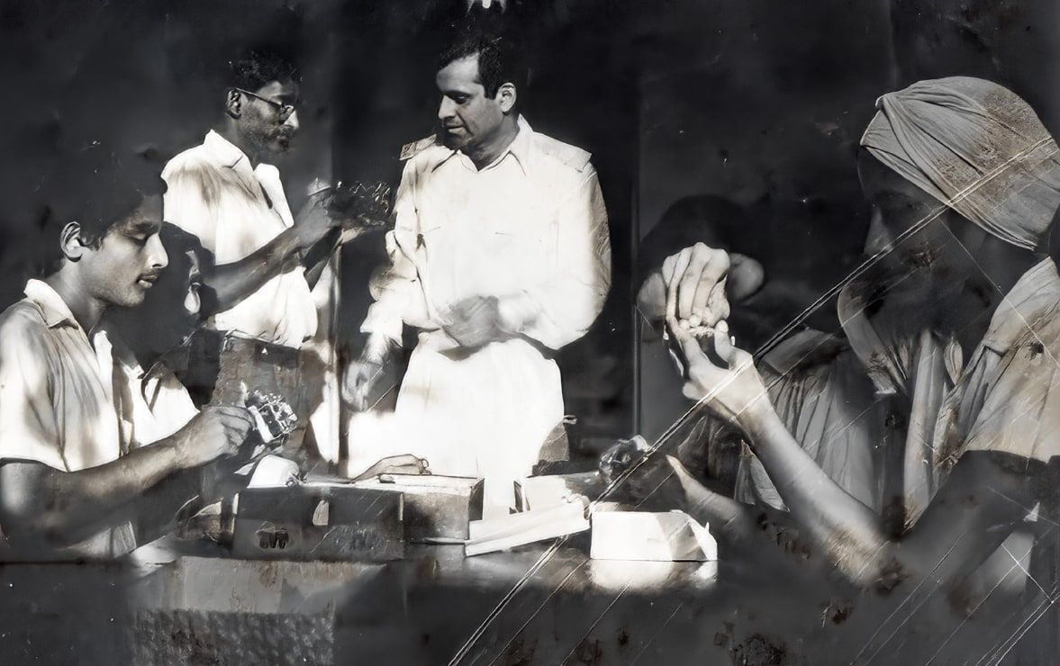 Promesse teaching watch-repair to Vandana, Bharat, Sampat & others